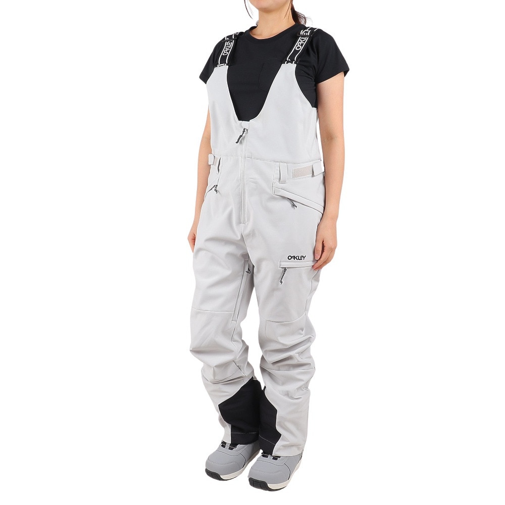 オークリー（OAKLEY）（レディース）22-23 ボードウェア ビブパンツ TC DHARMA SOFTSHELL BIB PANT  FOA500279-26C