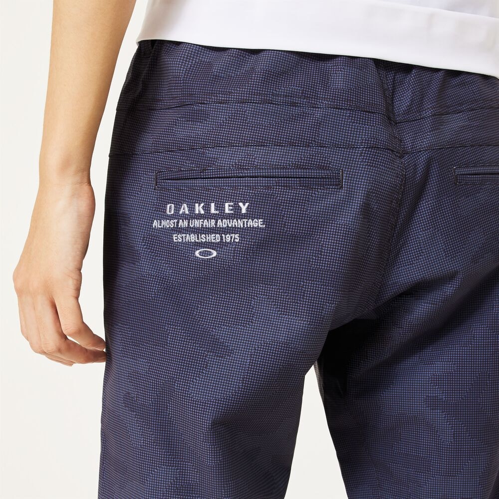 オークリー（OAKLEY）（メンズ）ゴルフウェア 吸汗速乾 DECISIVE アンクルテーパードパンツ FOA407640-02E