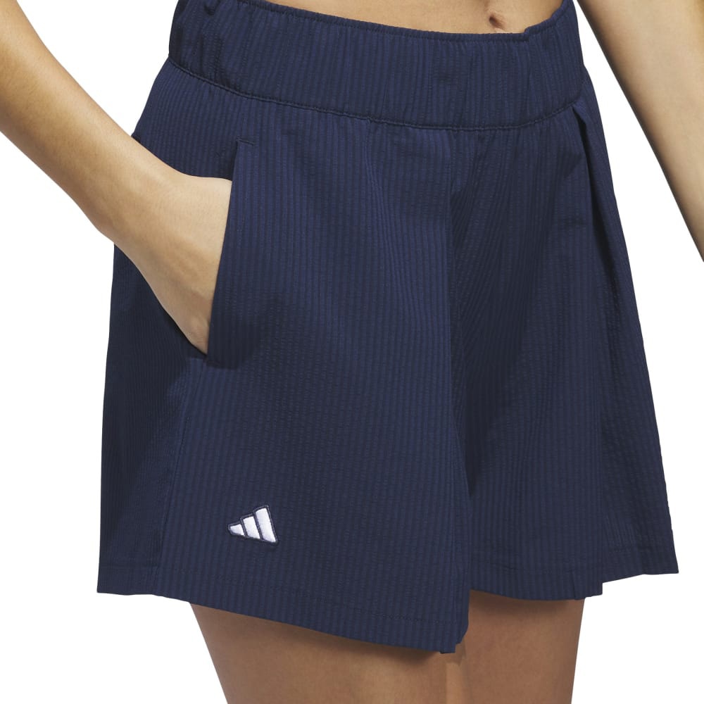 アディダス（adidas）（レディース）ゴルフウェア ビヨンド ザ コース 撥水プリーツ ショートパンツ KWH88-JE7313NVY