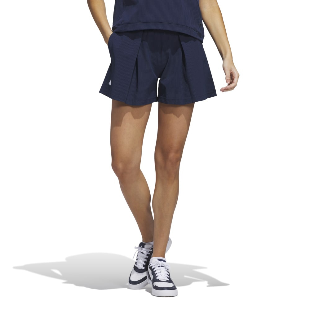アディダス（adidas）（レディース）ゴルフウェア ビヨンド ザ コース 撥水プリーツ ショートパンツ KWH88-JE7313NVY