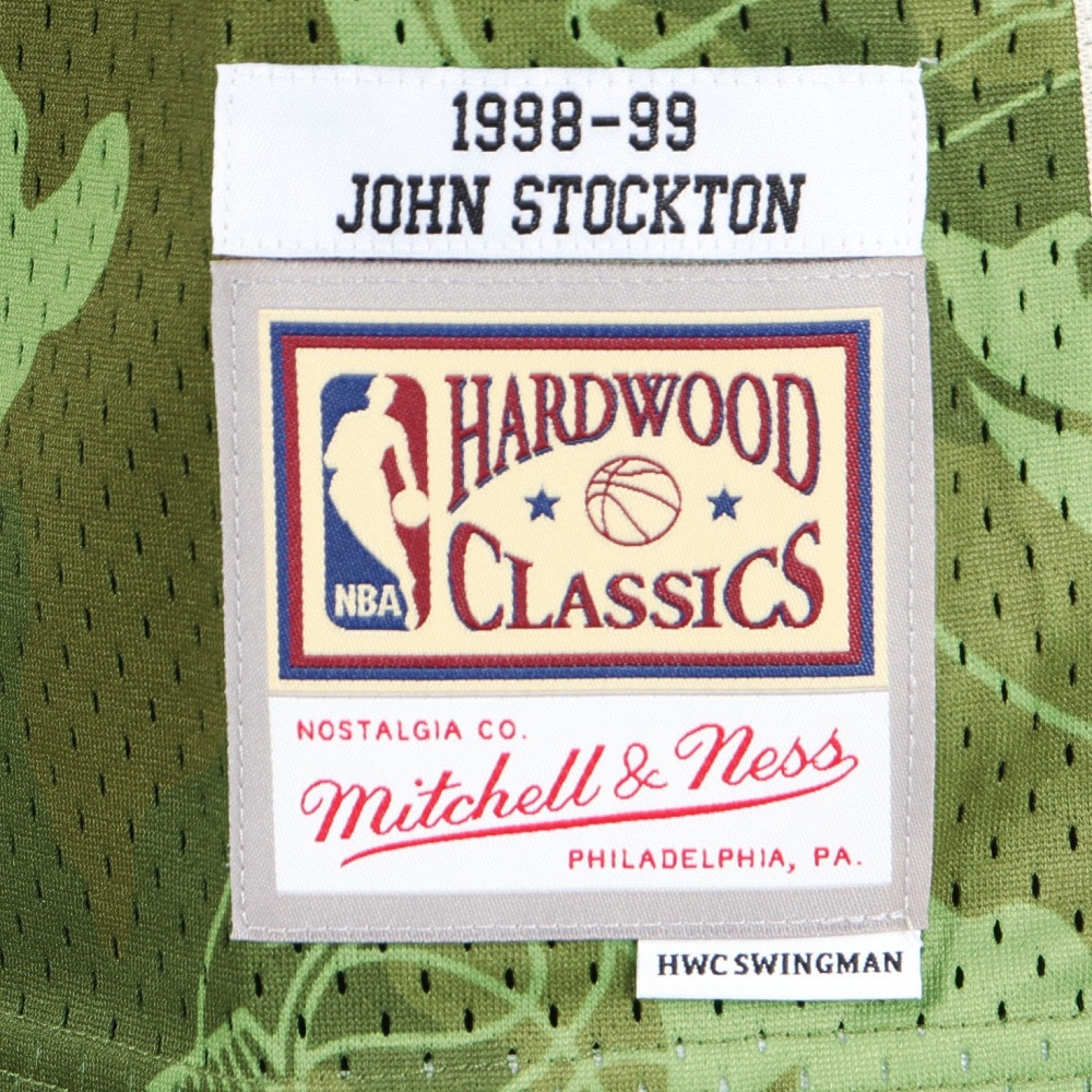 ミッチェルアンドネス（Mitchell&Ness）（メンズ）ユタ・ジャズ ジョン・ストックトン カモハードウッド クラシックスジャージ SMJY4362-UJACMGR