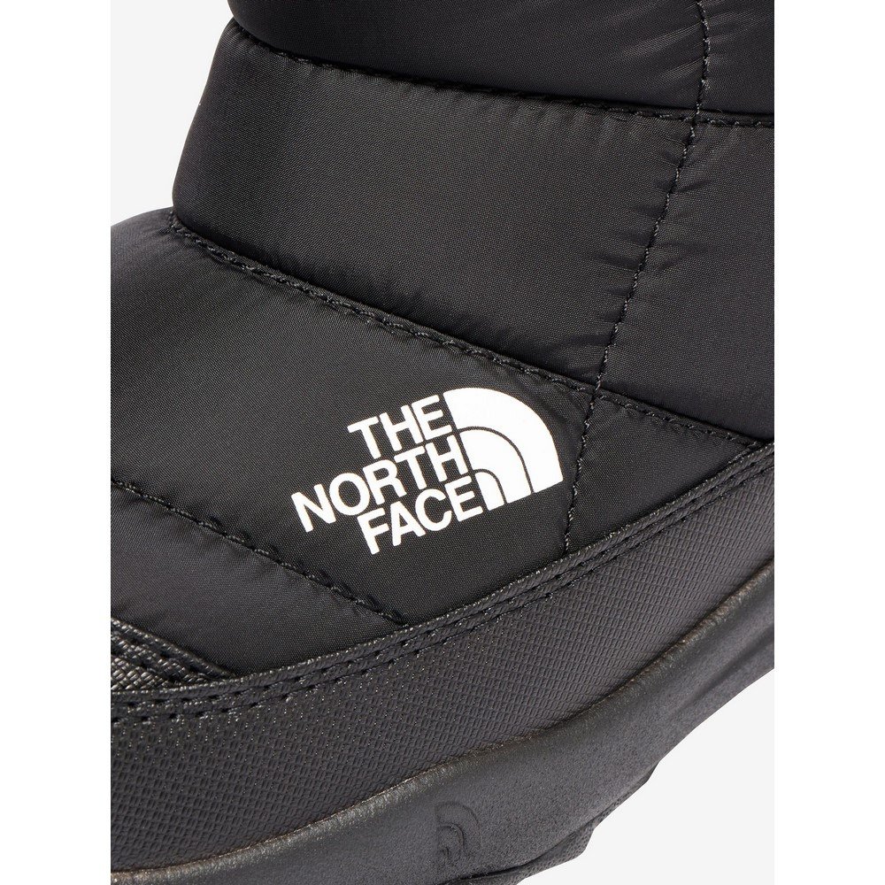 ザ・ノース・フェイス（THE NORTH FACE）（キッズ）ジュニアブーツ ヌプシ ブーティ ウォータープルーフ ブラック NFJ52287 KK カジュアルシューズ防水 保温 雪