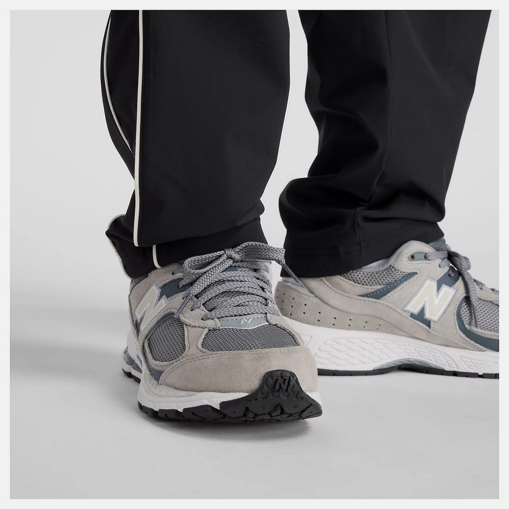 ニューバランス（new balance）（メンズ）Brushed Tricot Lined ウーブン トラックパンツ AMP53174BK