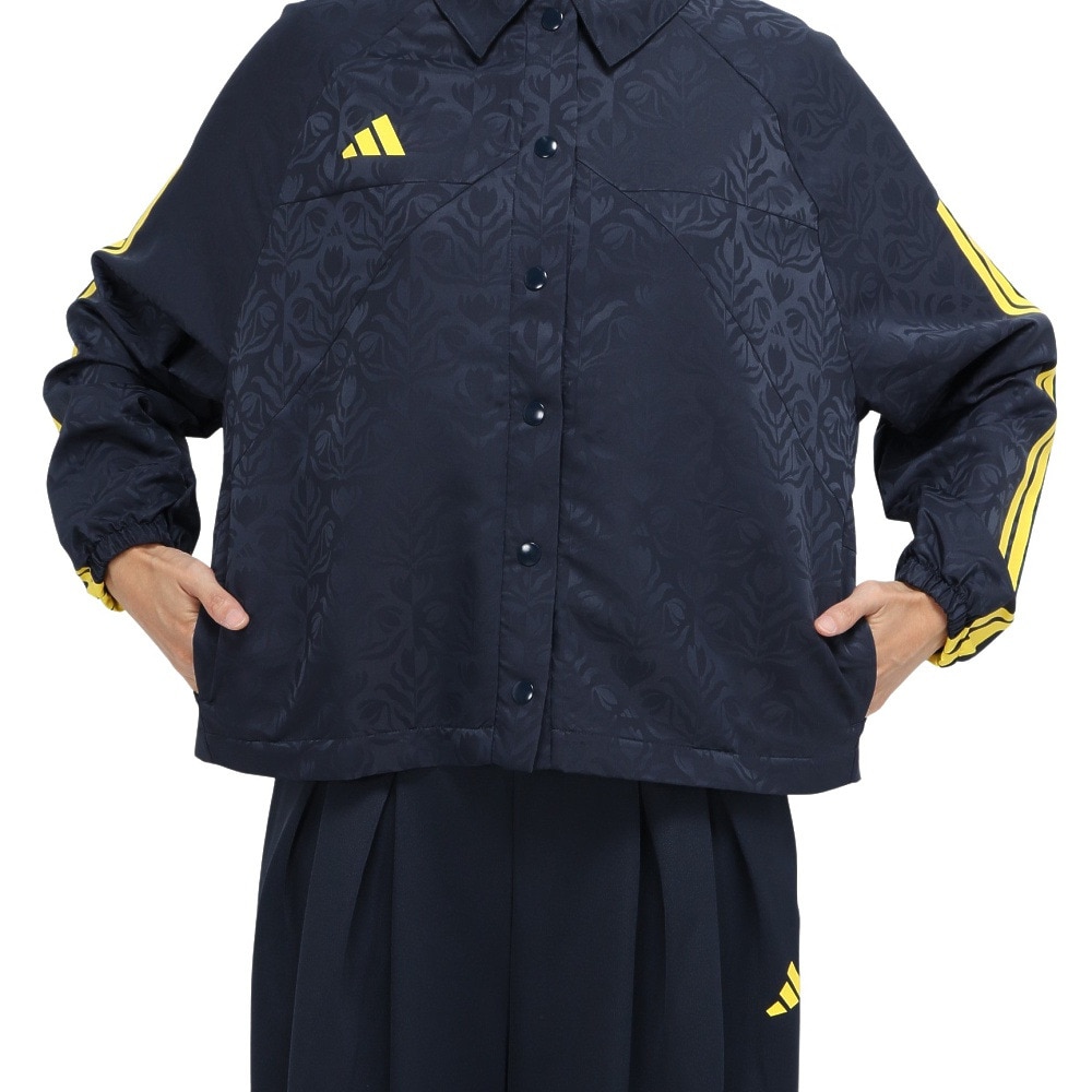 アディダス（adidas）（レディース）ティロ×Common Goal コーチ